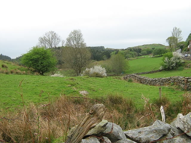 Green hills, rocky outcrops and trees, a typical welsh countryside scene